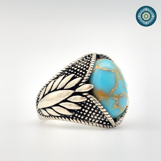 Oxidised silver signet ring with turquoise stone and feather-worked shank