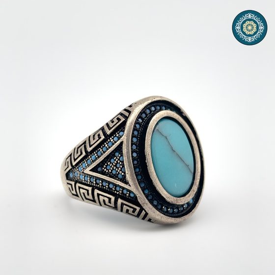 Silver signet ring with turquoise cabochon and Greek meander border
