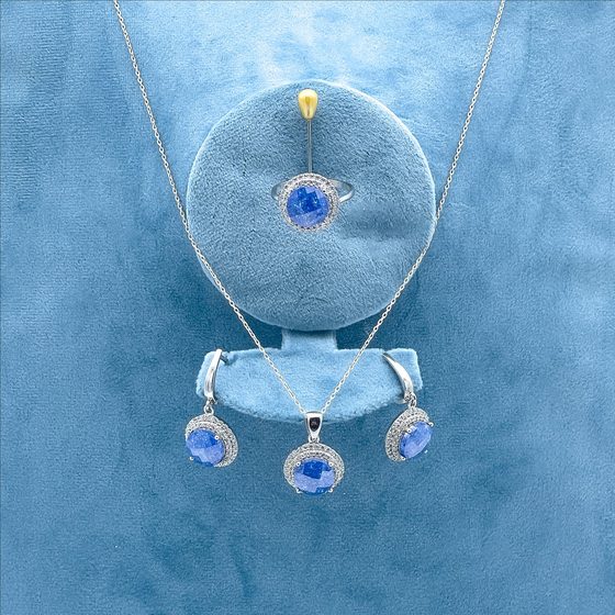 Silver set of necklace, ring and earrings with blue sapphire stones